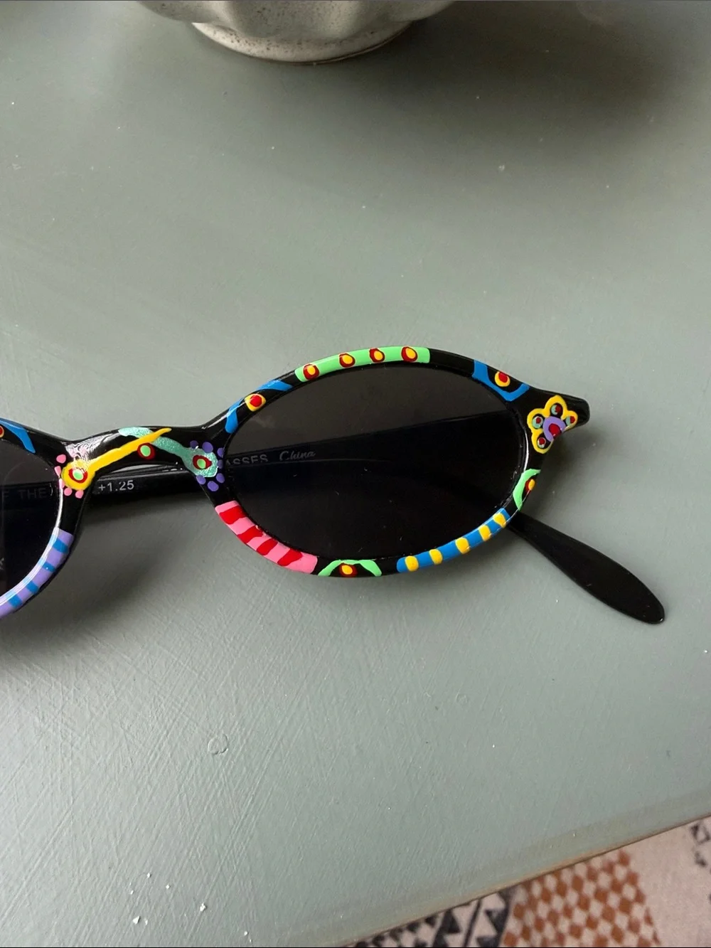 Black Oval Sunglasses with Multicolor Hand-Painted Accents